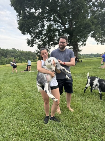 Bobby Gagnon & Molly Gagnon holding a goat